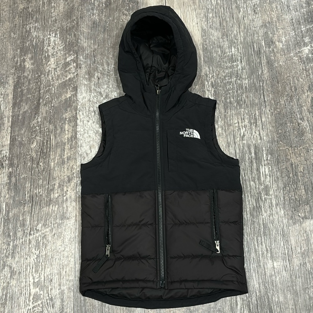 The North Face hooded zip-up vest, youth/junior Small (7/8). EUC, Black/White.